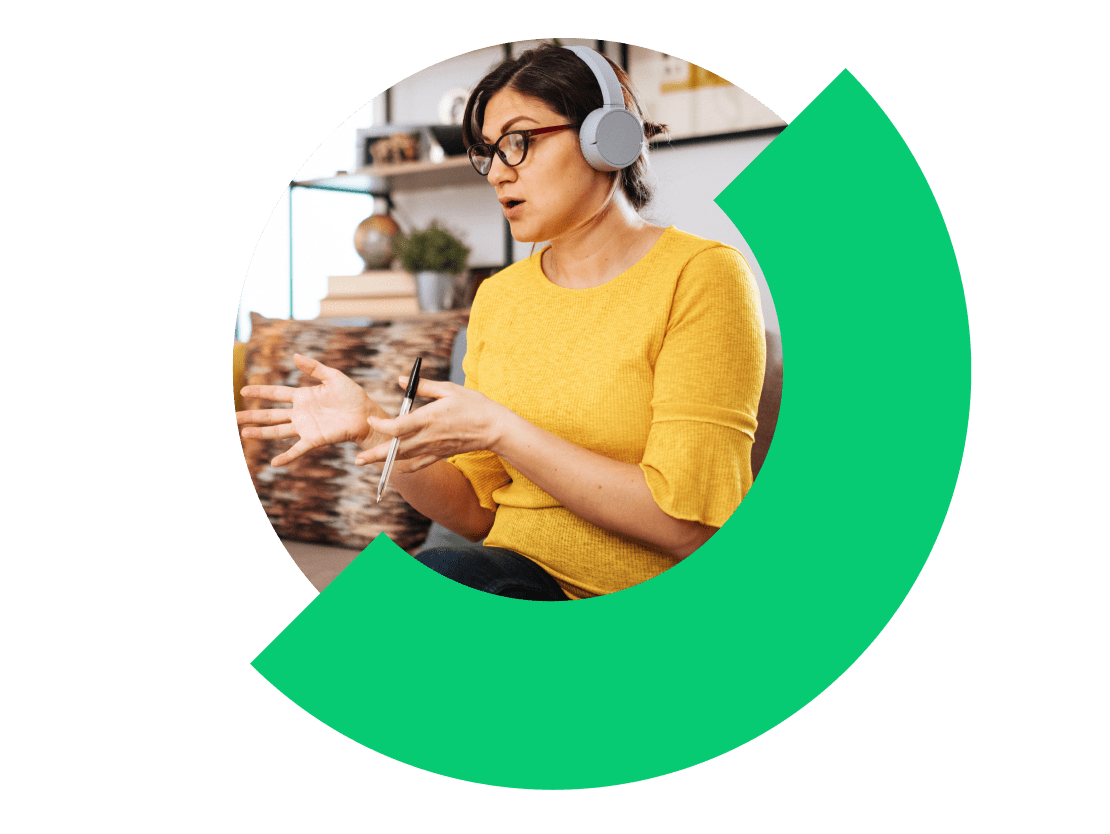 Teacher using GoTo Connect to meet virtually with a student.