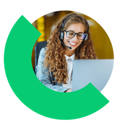 Person in office using business communication software on a laptop.