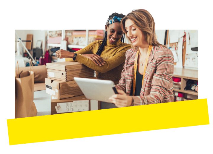 Two business owners easily manage their business with GoTo Connect's AI-powered tools and multi-channel communication features.